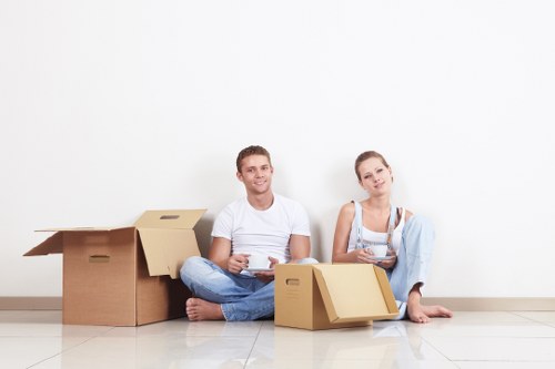 Professional movers handling compact household items in Kingsbury