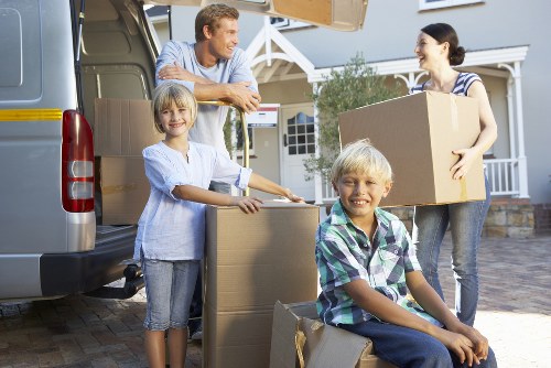 Packed storage boxes and furniture ready for collection in Kingsbury